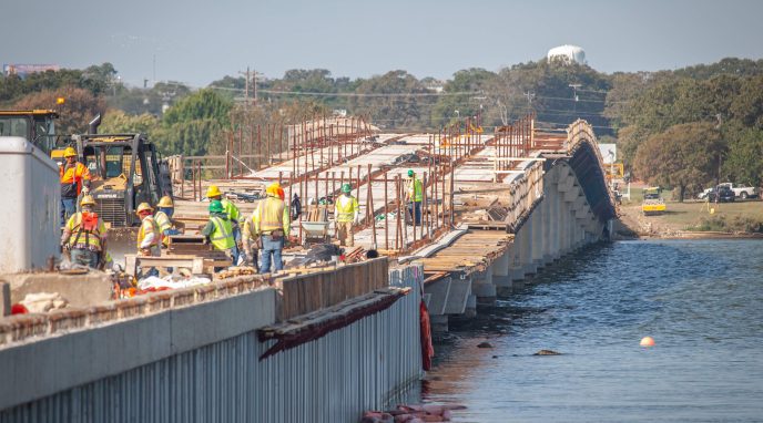 construction workers working on SH 334 Bridge project